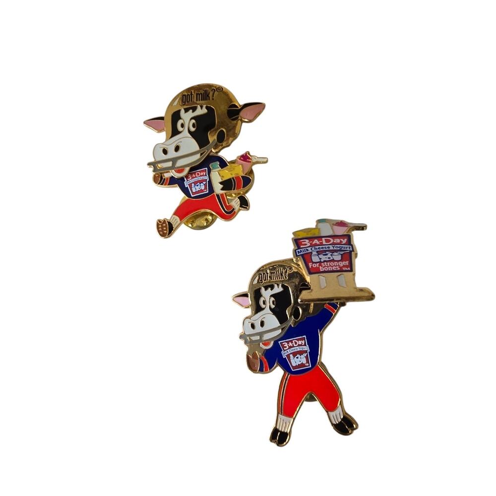 Vintage Set of 2 Milk Advertisement Cow Pins Moving Sign Dairy